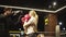 Serious sport couple boxing at gym. Fit girl training with coach in sport club