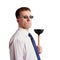 Serious, stern man in a tie with a plunger in his hand. Isolated