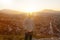 Serious teen looking sideways to the city of Prizren, Kosovo in