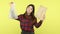 Serious woman holding plastic and paper bags, suggesting to make right choice