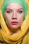 Serious woman wearing colourful headscarf