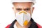 Serious worker wearing respirator