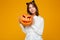 Serious young woman dressed in crazy cat halloween costume
