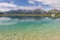 The Serles mountain, an intimidating but beautiful presence, reflects in one of the man made lakes, Mieders, Austria