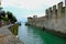 Sermione, Italy - August 09, 2018: People are walking on colorful streets of Sermione.Town on Garda Lake, Italy