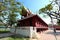 The sermon pavilion is a large Thai house