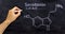 Serotonin structural chemical formula, chalk drawing on a blackboard