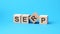 SERP word made with building blocks on a light blue background