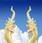 Serpent king of nagas statue on blue sky