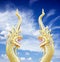 Serpent king of nagas statue on blue sky
