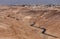 Serpentine road descending from city Arad to the Dead Sea, Judaean Desert, Israel.