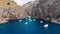Serra De Tramuntana,Sa Calobra, Torrent De Pareis beach, aerial ,crystal clear water of mediterranean sea with moored