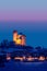 Serralunga castle during a cold winter night with snow in langhe