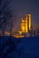 Serralunga castle during a cold winter night with snow in langhe