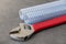 serrated kitchen drain pipe and wrench