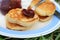 Serve pancakes with jam in a plate for breakfast