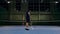 Serve by professional tennis player. Tennis serve indoor of tenis hall. Man on serve with tenis racket and dressed in