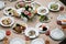 Served for banquet restaurant table with dishes, snack, cutlery, wine and water glasses, european food, selective focus