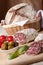 Served kitchen table salami, breadbasket, s