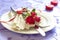 Served plate with napkin and rose in Valentine day