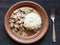 Served portion of Beef Stroganoff meal in dark