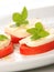 Served tomato with mozzarella and basil