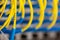 Server front side showing colorful switches and wiring Abstract blurred image for use as a background