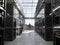 Servers and hardware room with notebook and coffee cup computer technology closeup photo