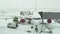 Service of the aircraft preparation for flight at a snowy aerodrome of Astana International Airport stock footage video