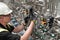 A service engineer checks an pneumatic valve