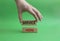 Service here symbol. Concept words Service here on wooden blocks. Beautiful green background. Businessman hand. Business and