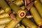 Service rifle cartridges on heap close-up in selective focus