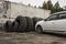 Service station for cars. Old tires on the yard