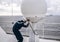 Service technician or serviceman near VSAT terminal