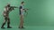 Serviceman in uniform with machine gun caughts civilian with a weapon against chromakey background