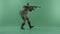 Serviceman walks with a machine gun in side profile against chromakey background