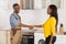 Serviceman And Woman Handshaking