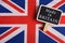 services concept - Great Britain country's flag, blackboard with text Made in Britain