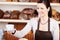 Serving coffee in a bakery