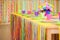 Serving colorful table with decoration for child birthday