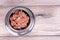 Serving of minced raw barf beef meat for dog meal
