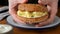 Sesame bagel sandwich with scrambled eggs