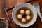 Sesame big tangyuan with syrup soup