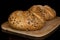 Sesame kaiser roll isolated on black glass