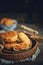 Sesame meat muffins, traditional handmade food, dark background