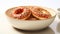 Sesame Seed Bagels In Oriental Red And White Bowl