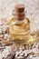 Sesame seed oil in glass bottle closeup vertical