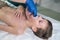 Session of craniosacral therapy, cure of teen boy& x27;s jaws by a doctor therapist.