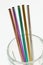 Set of 5 coloured Stainless Steel Straws in glass