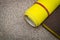 Set of abrasive tools and yellow sandpaper for cleaning or sanding various objects